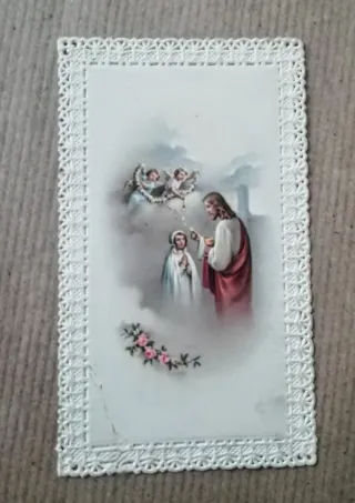 Antica stampa religiosa con merletto