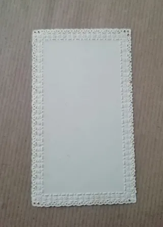 Antica stampa religiosa con merletto