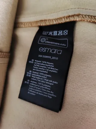 Falda efecto piel marrón. Da poca talla (40)