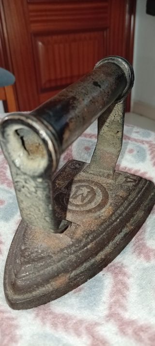 Plancha antigua de hierro