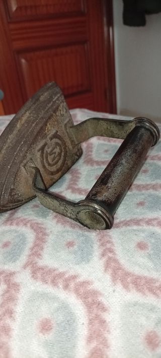 Plancha antigua de hierro