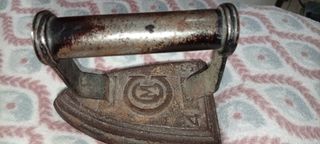 Plancha antigua de hierro