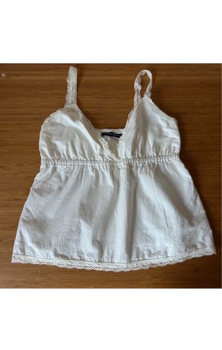 Top Brandy Melville babydoll blanco encaje