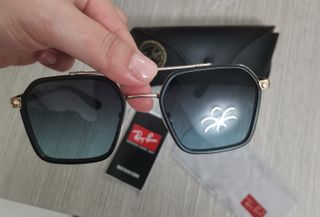 Occhiali da sole Ray-Ban neri e oro