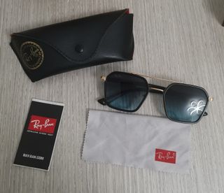 Occhiali da sole Ray-Ban neri e oro