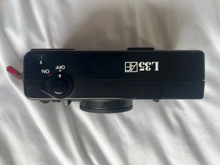 Nikon L35AF con filtro UV