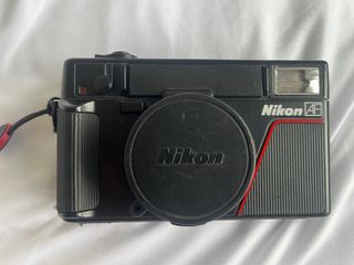 Nikon L35AF con filtro UV