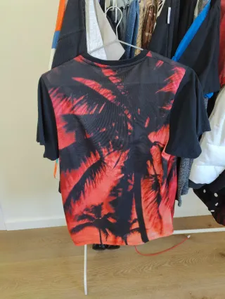 Camiseta K1X con palmeras