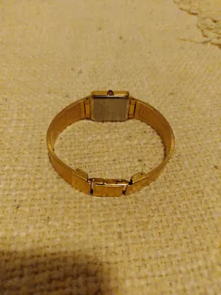 Reloj Seiko Dorado y Plateado