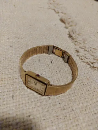 Reloj Seiko Dorado y Plateado