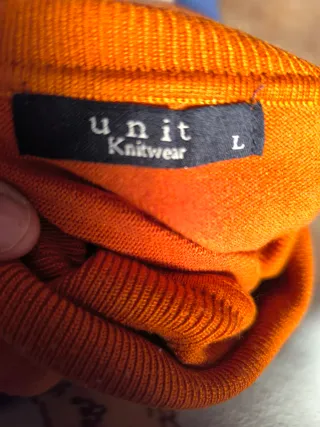 Jersey mujer cuello alto color tabaco y rayas azul