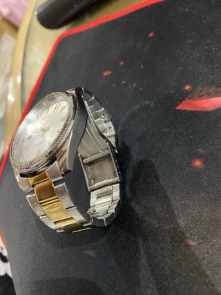 Reloj Casio Dorado y Plateado WR 50M