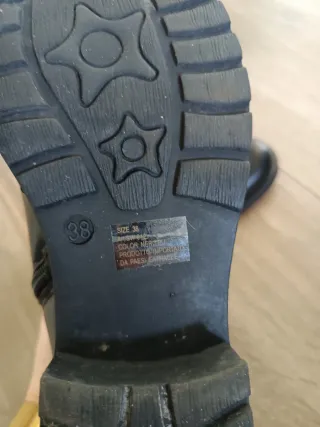 Stivaletti neri trapuntati con fibbia