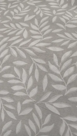 Tejido loneta con estampado de hojas gris