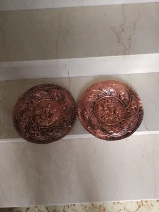 Coppia piatti decorativi rame sbalzato