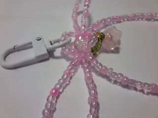 Portachiavi fiocco rosa con ciondolo