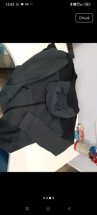 Tuta uomo nero e blu