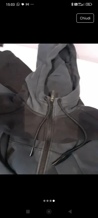 Tuta uomo nero e blu