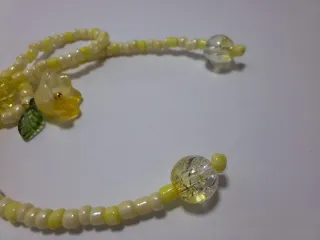 Portachiavi fiocco giallo con fiorellino