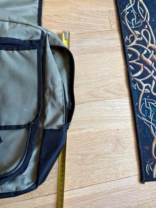 Mochila bandolera Coca Cola beige y negra