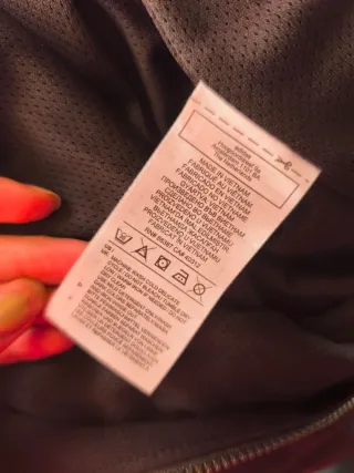 Chaqueta deportiva Adidas negra y blanca