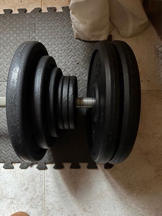 Barra y Mancuernas con Discos