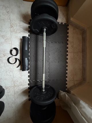 Barra y Mancuernas con Discos