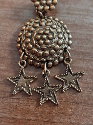 Pendientes vintage dorados con estrellas (clip)