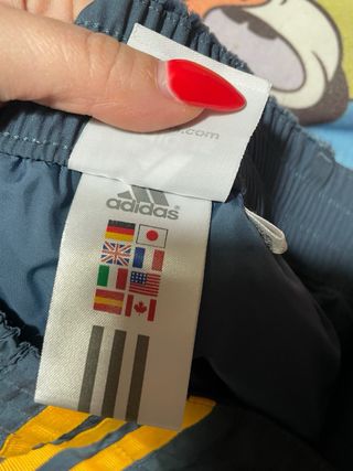 Pantaloni sci Adidas blu e arancio