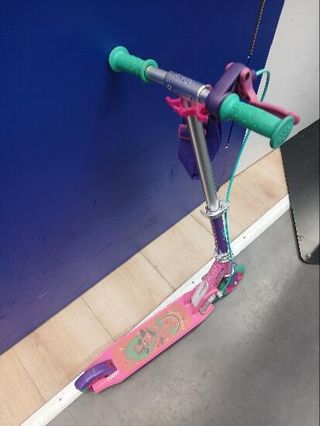 Patinrte infantil Oxelo Play 5 girl rosa y morado