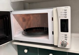 Microondas Grill Candy CMG 250 DW