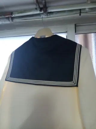 Traje comunión niño beis y azul marino.