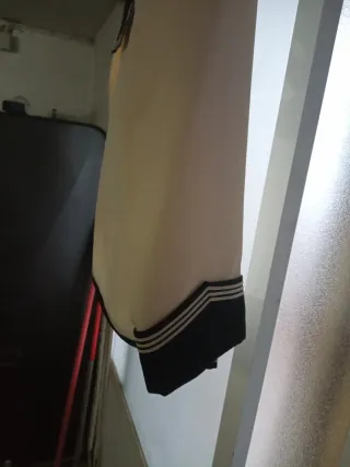 Traje comunión niño beis y azul marino.