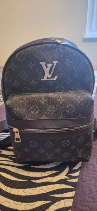 Mochila Louis Vuitton Marrón y Dorada
