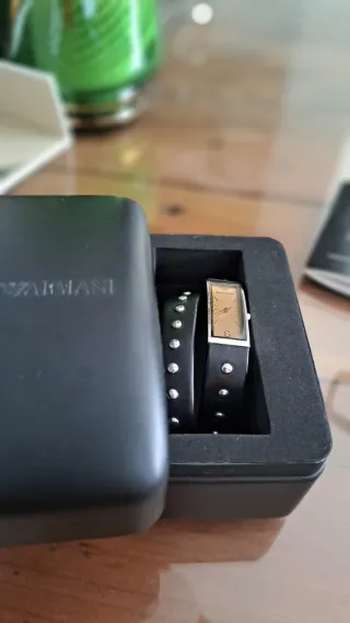 Reloj Emporio Armani Cuero marrón y plateados.