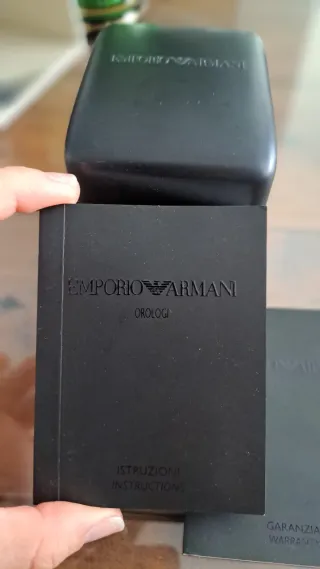 Reloj Emporio Armani Cuero marrón y plateados.