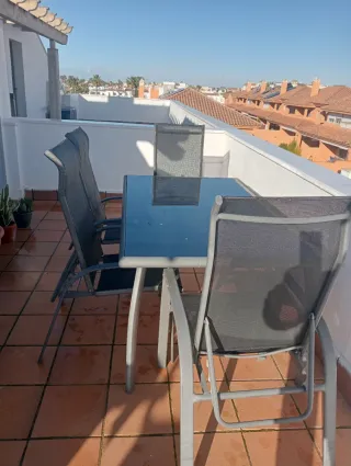 Mesa y 4 sillas de terraza cristal y aluminio 1,70