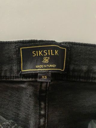Pantalones SikSilk negros rotos