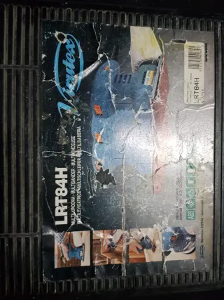 Lijadora orbital con caja y accesorios