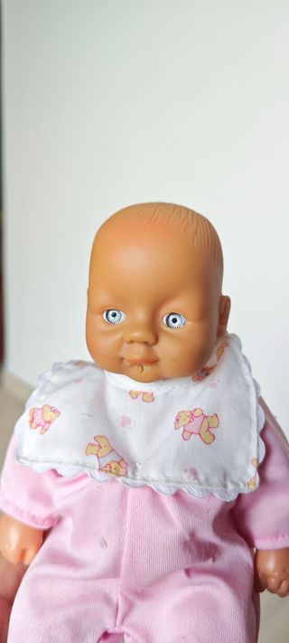 Bambolotto neonata occhi azzurri tutina rosa