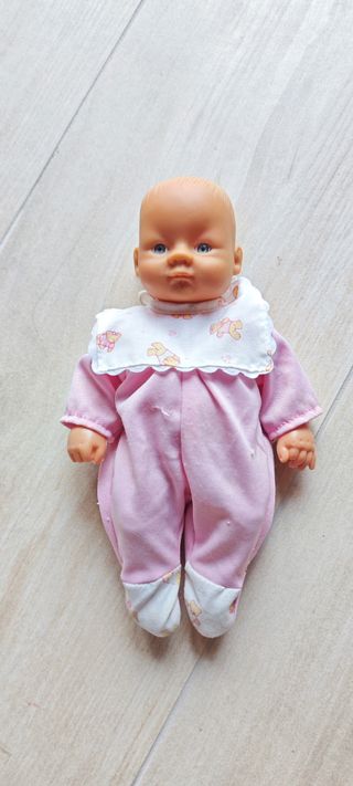 Bambolotto neonata occhi azzurri tutina rosa