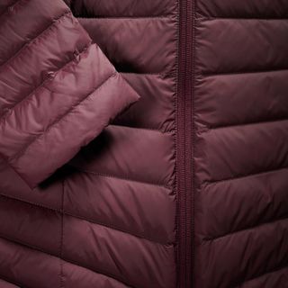 Plumífero de montaña y trekking con capucha Mujer Forclaz