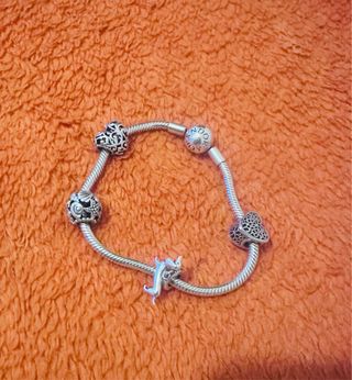 Pulsera Pandora con 4 charms