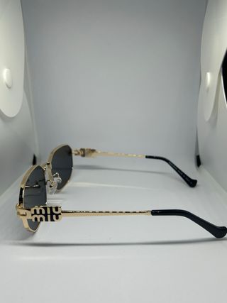 Occhiali da sole Miu Miu oro e neri