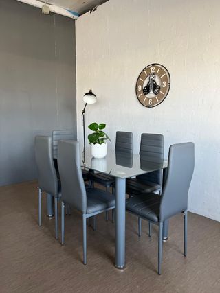 Mesa de cristal con 6 sillas grises + Envio gratis