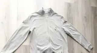 2 Chaquetas Deportivas Domyos (Negra y Gris).