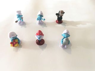 Confezione da 12 action figure dei Puffi. NUOVI