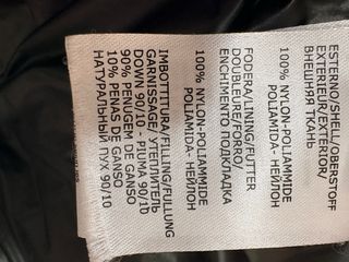 Plumífero verde con capucha y pelo