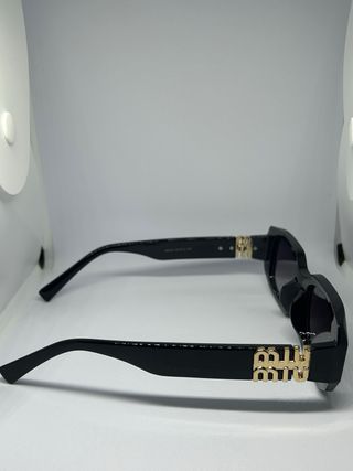 Occhiali Miu Miu Rettangolari Donna Nero/Oro