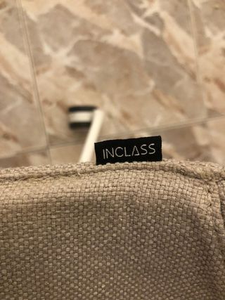 Silla giratoria de tela y metal